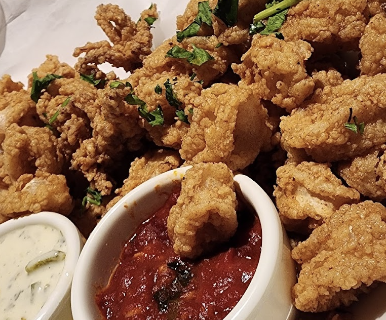 Yard House signature dishes Nashville Hot Chicken SandwichVampire TacosStreet Tacos